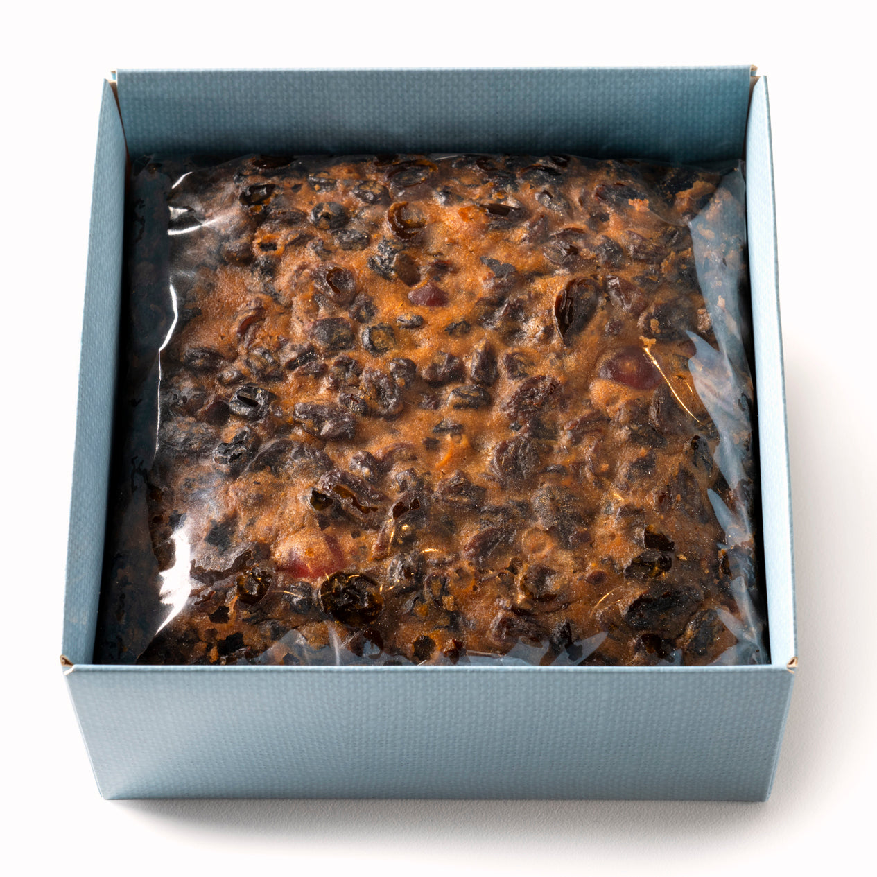 Bryson's Boxed Fruitcake is made with butter, eggs, raw sugar, currants, sultanas and cherries.