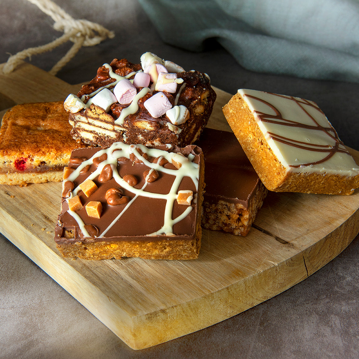 Picnic Slice, Rocky Road Slice, Caramel Tiffin Slice, Toffee Crisp Slice and Honeycomb Tiffin Slice.